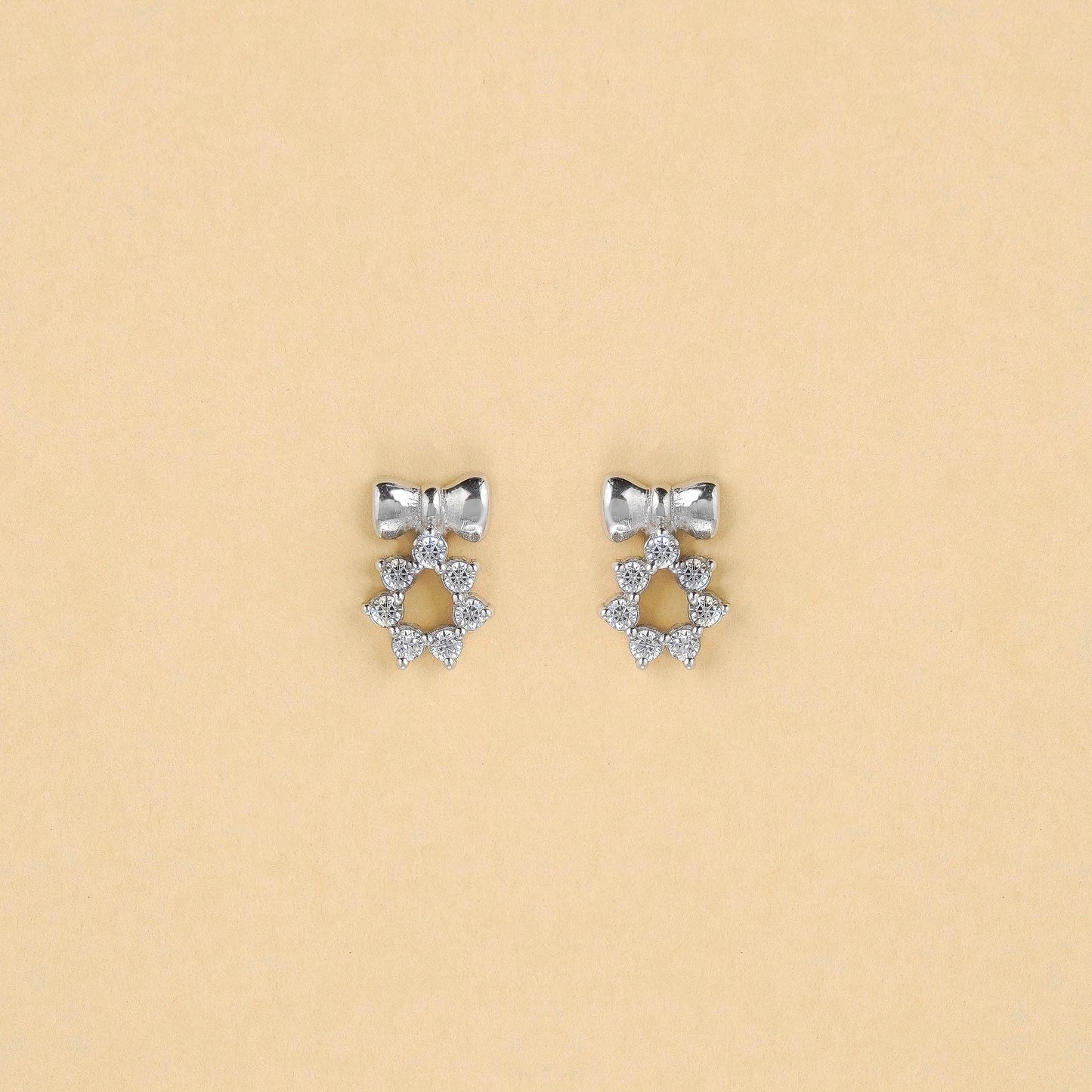 Sparkling Bowtie Silver Floral Studs